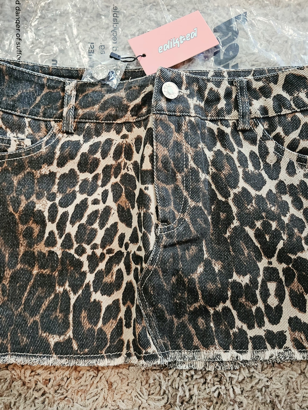 Edikted Leopard-Print Denim Mini Skirt with Pink Bow Accents